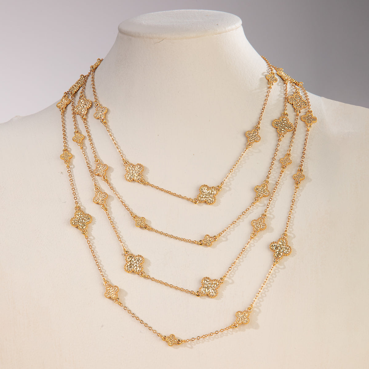 Gilded Textures Layered Clover Necklace