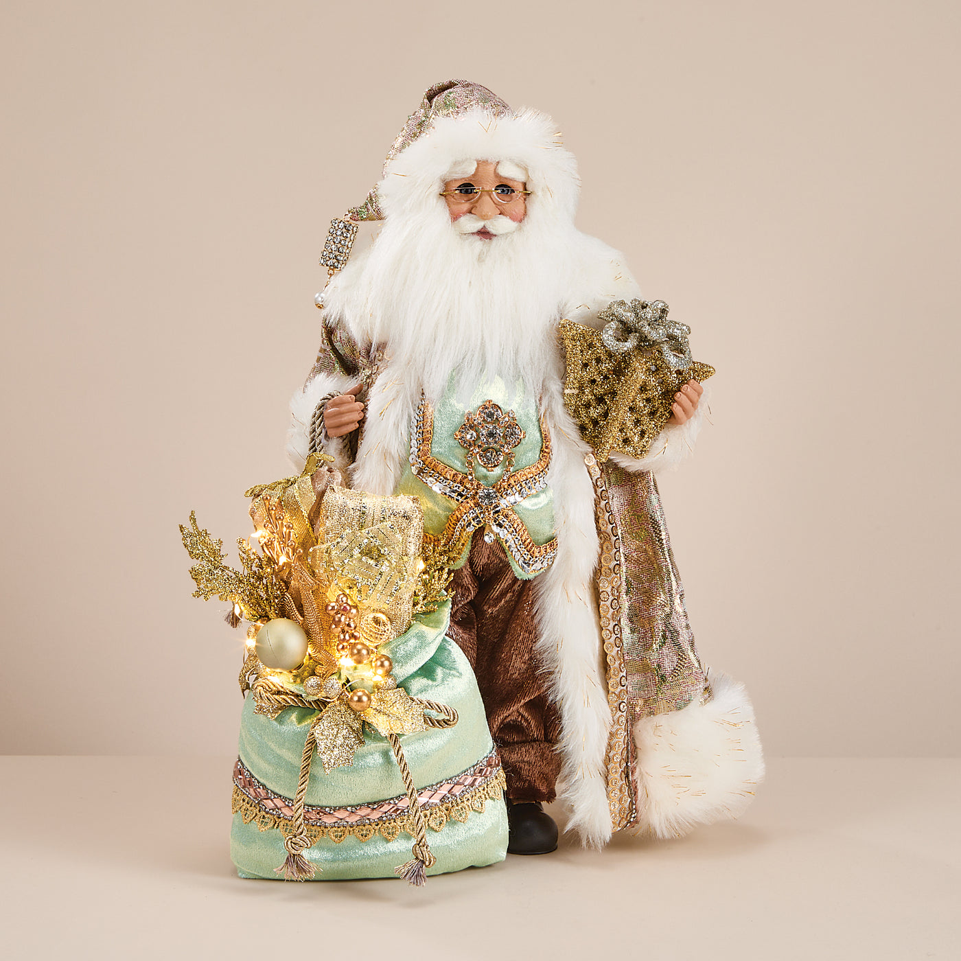 Golden Santa with Glowing Gift Sculpture
