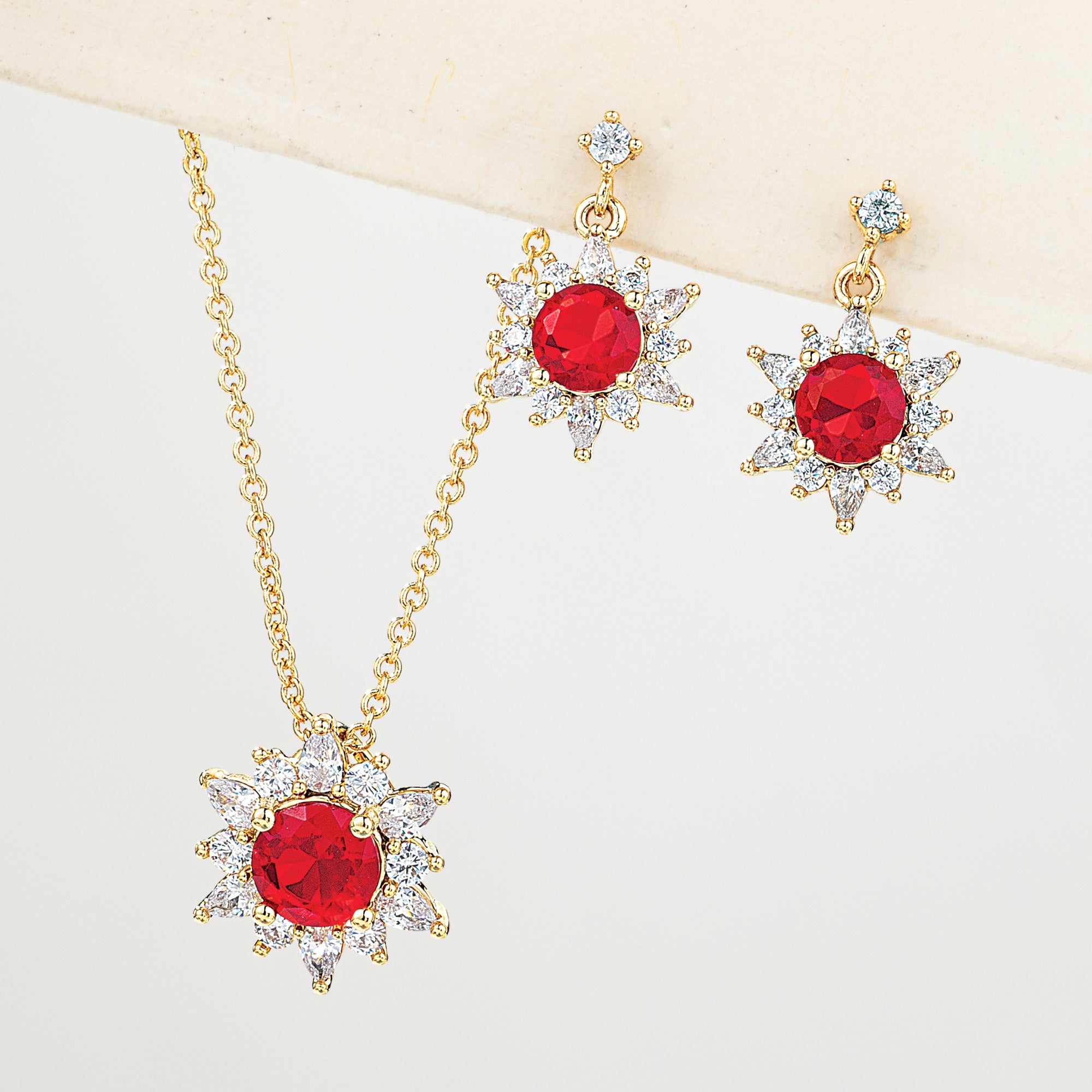 Sparkling Ruby Star Necklace & Earrings Set