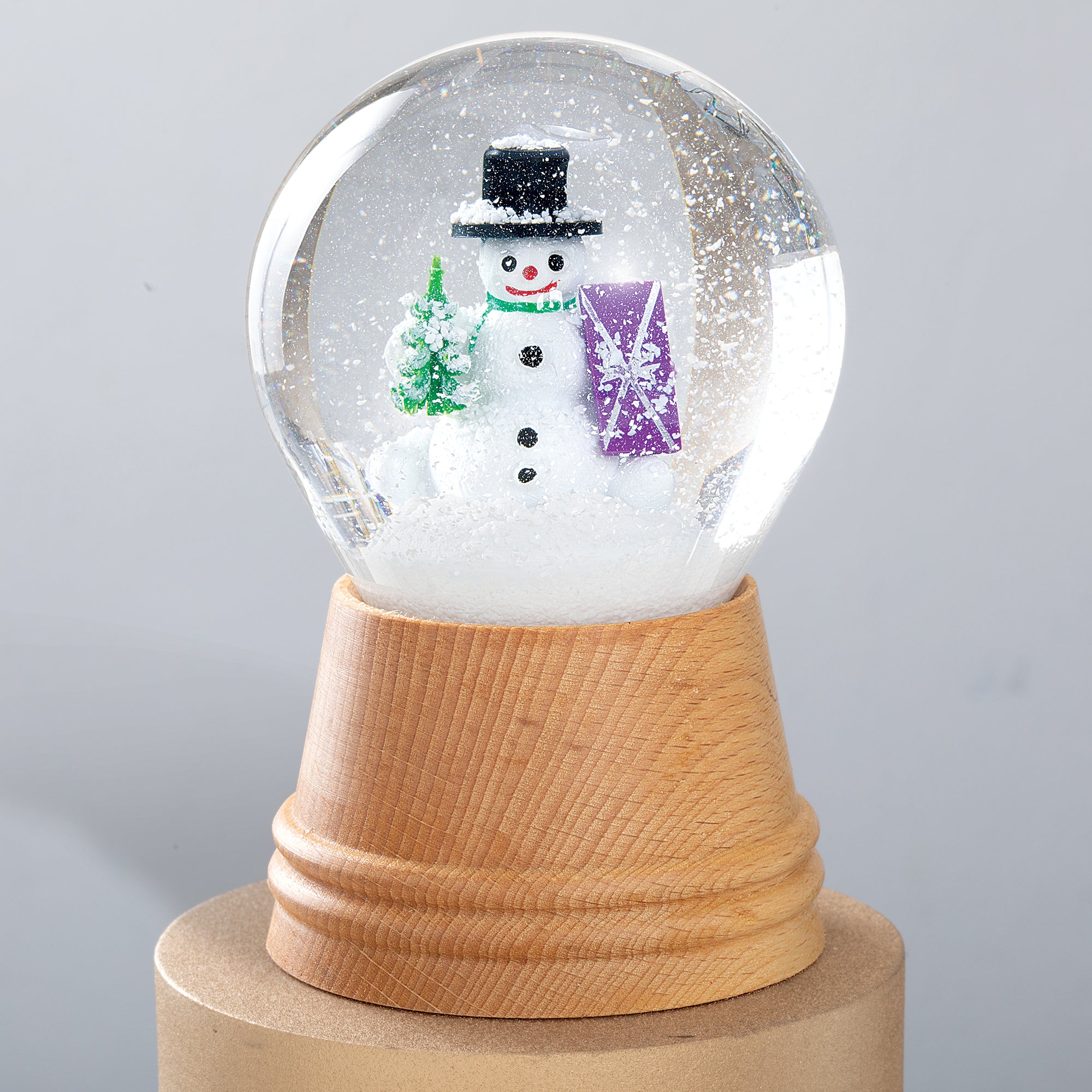 Gift Giving Snowman Snow Globe