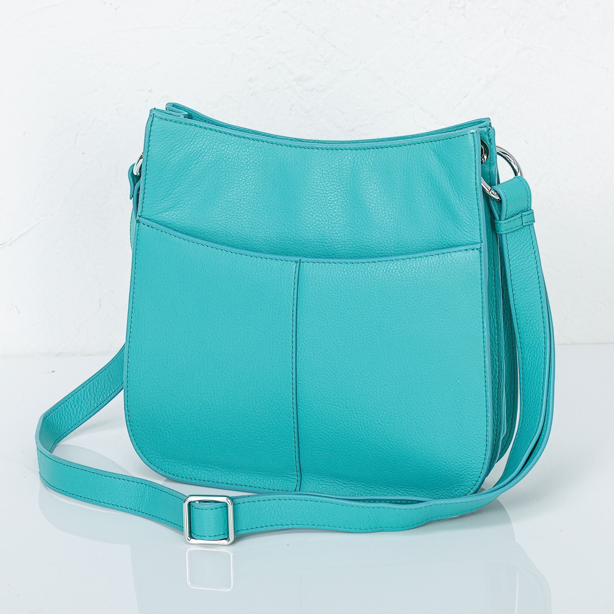 Turquoise Leather Tasseled Crossbody Bag